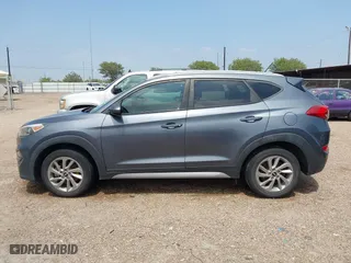 2017 Hyundai Tucson SE Plus with VIN KM8J33A42HU375273, listed as a IAAI auction lot 41900474 with 124,658 mi miles. Bid and sale history available at carsss.com. Image 14.