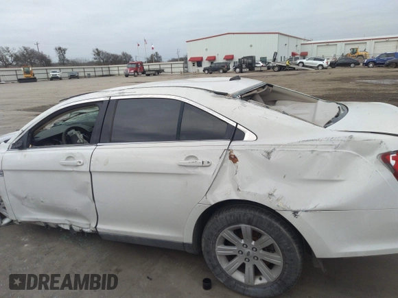 2011 Ford Taurus SE with VIN 1FAHP2DW3BG113398, listed as a IAAI auction lot 41617959 with 123,706 mi miles. Bid and sale history available at carsss.com. Image 13.