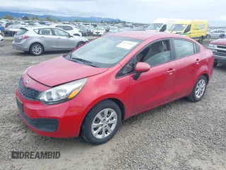 2013 Kia Rio LX with VIN KNADM4A30D6179274, listed as a IAAI auction lot 42014845 with 115,238 mi miles. Bid and sale history available at carsss.com. Image 2.
