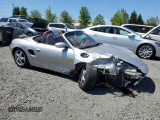 1998 Porsche Boxster z VIN WP0CA2986WU620657, wystawiony jako Copart lot #55595275 z przebiegiem 78 711 mil mil oraz Szkoda całkowita • Salvage title. Historia ofert i sprzedaży dostępna na DreamBid. Obrazek 4.
