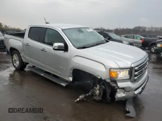 2015 GMC Canyon 4WD SLT with VIN 1GTG6CE35F1251486, listed as a Copart auction lot 46884015 with 162,144 mi miles and Salvage Title. Bid and sale history available at carsss.com. Image 4.