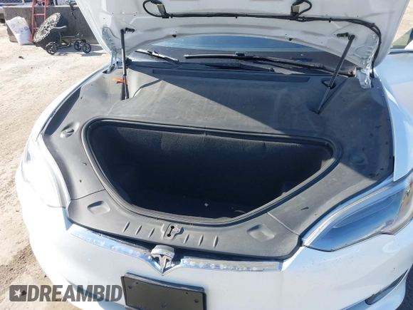 2020 Tesla Model S Long Range with VIN 5YJSA1E23LF360441, listed as a IAAI auction lot 41312865 with 68,967 mi miles and . Bid and sale history available at DreamBid. Image 17.