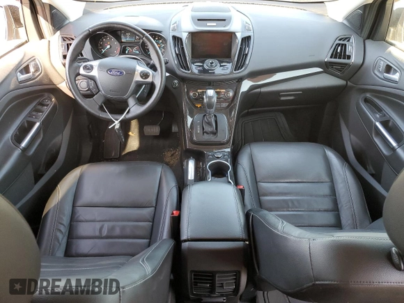 2015 Ford Escape Titanium with VIN 1FMCU0J95FUB59026, listed as a Copart auction lot 65047545 with 84,259 mi miles and Salvage title. Bid and sale history available at DreamBid. Image 8.