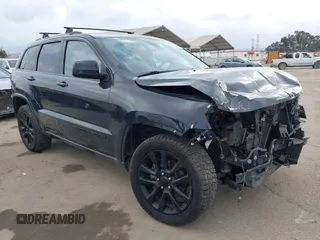 2018 Jeep Grand Cherokee Altitude with VIN 1C4RJFAG4JC122282, listed as a IAAI auction lot 42126483 with 79,184 mi miles and . Bid and sale history available at DreamBid. Image 1.
