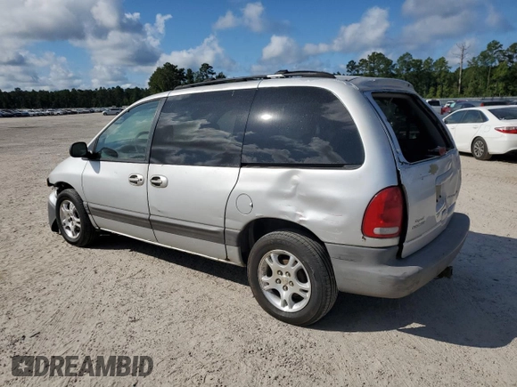 2000 Dodge Caravan SE with VIN 2B4GP45G0YR525310, listed as a Copart auction lot 69596394 with 299,957 mi miles and Salvage Title. Bid and sale history available at carsss.com. Image 2.