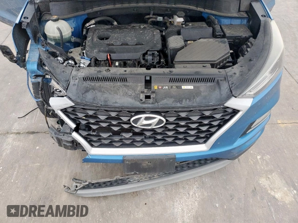 2019 Hyundai Tucson Sport z VIN KM8J33AL5KU861199, wystawiony jako Copart lot #55126555 z przebiegiem 75 432 mil mil oraz Szkoda całkowita • Salvage title. Historia ofert i sprzedaży dostępna na DreamBid. Obrazek 12.
