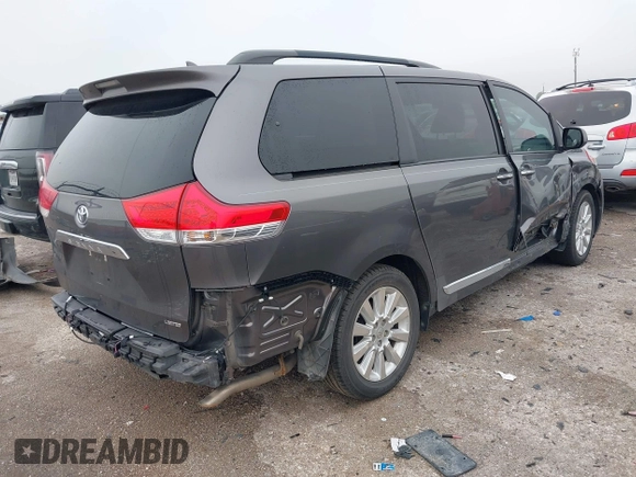 2011 Toyota Sienna XLE AAS with VIN 5TDYK3DC9BS158209, listed as a IAAI auction lot 42163526 with 107,385 mi miles and . Bid and sale history available at DreamBid. Image 4.