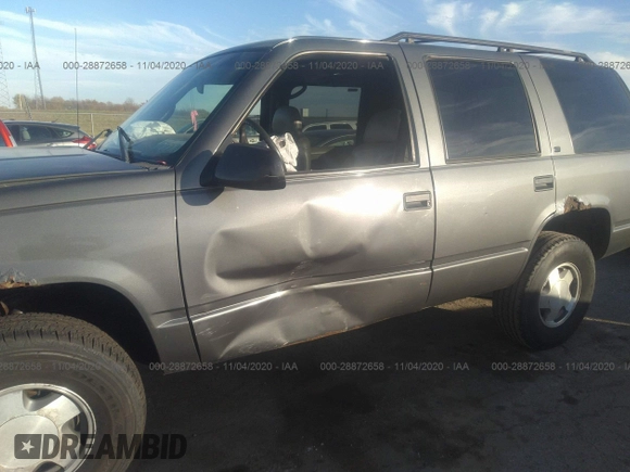 1999 Chevrolet Tahoe Z71 with VIN 1GNEK13R7XJ528100, listed as a IAAI auction lot 28872658 with 158,958 mi miles and . Bid and sale history available at DreamBid. Image 12.