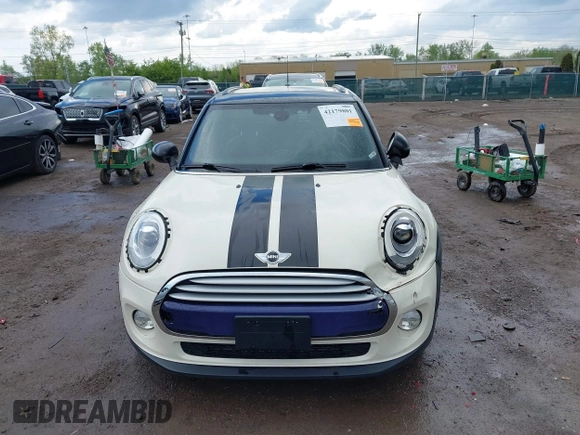2015 MINI Hardtop 4 Door with VIN WMWXS5C52FT831291, listed as a IAAI auction lot 42179801 with 63,261 mi miles and . Bid and sale history available at DreamBid. Image 13.