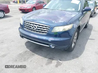 2007 Infiniti FX35 with VIN JNRAS08W77X208496, listed as a IAAI auction lot 42104796 with 165,267 mi miles. Bid and sale history available at carsss.com. Image 6.