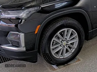 2022 Chevrolet Traverse LT Cloth with VIN 1GNEVMKW7NJ123108, listed as a IAAI auction lot 42854233 with 63,624 mi miles and . Bid and sale history available at DreamBid. Image 17.
