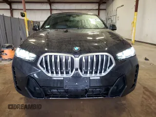 2025 BMW X6 xDrive40i with VIN 5UX33EX00S9W90983, listed as a Copart auction lot 46921935 with 25,566 mi miles and Clean Title. Bid and sale history available at carsss.com. Image 5.