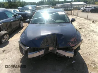 2021 Kia K5 LXS z VIN 5XXG14J25MG017125, wystawiony jako IAAI lot #42177700 z przebiegiem 55 855 mil mil oraz . Historia ofert i sprzedaży dostępna na DreamBid. Obrazek 12.