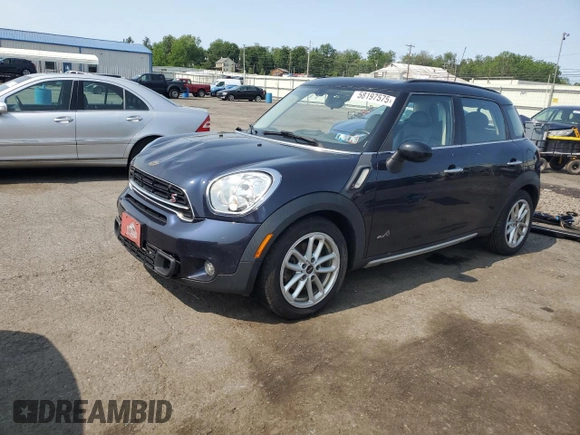 2015 MINI Countryman S z VIN WMWZC5C54FWP48739, wystawiony jako Copart lot #58197575 z przebiegiem 119 816 mil mil oraz Szkoda całkowita • Salvage title. Historia ofert i sprzedaży dostępna na DreamBid. Obrazek 1.