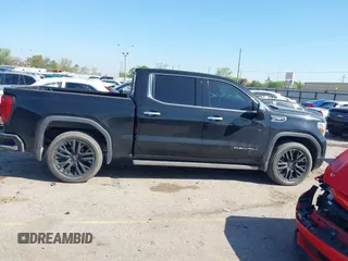 2020 GMC Sierra 1500 Denali with VIN 1GTU9FEL0LZ369793, listed as a IAAI auction lot 41870341 with 81,959 mi miles and . Bid and sale history available at DreamBid. Image 13.