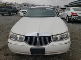 2001 Lincoln Town Car Cartier L z VIN 1LNHM85W11Y610538, wystawiony jako Copart lot #47881055 z przebiegiem 139 032 mil mil oraz Szkoda całkowita • Salvage title. Historia ofert i sprzedaży dostępna na DreamBid. Obrazek 5.