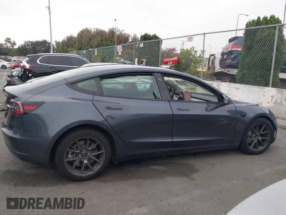 2023 Tesla Model 3 with VIN 5YJ3E1EA4PF705949, listed as a IAAI auction lot 42336682 with 88,056 mi miles and . Bid and sale history available at DreamBid. Image 13.
