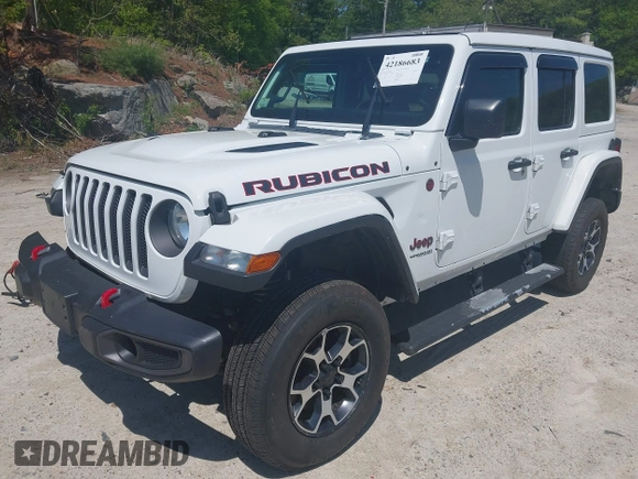 2021 Jeep Wrangler Unlimited Rubicon with VIN 1C4HJXFG5MW586842, listed as a IAAI auction lot 42186683 with 76,450 mi miles and . Bid and sale history available at DreamBid. Image 2.