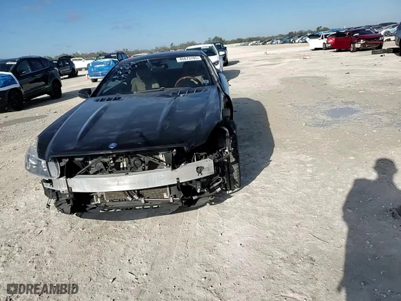 2009 Mercedes-Benz SL-Class V8 with VIN WDBSK71F09F144591, listed as a Copart auction lot 46873785 with 63,977 mi miles and Salvage Title. Bid and sale history available at carsss.com. Image 11.