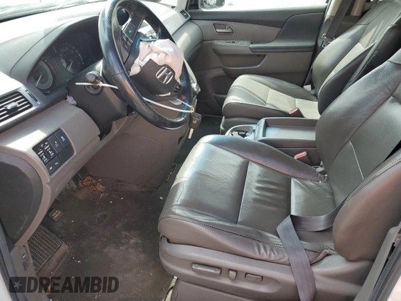 2012 Honda Odyssey Touring z VIN 5FNRL5H93CB070824, wystawiony jako Copart lot #49213465 z przebiegiem 287 745 mil mil oraz Szkoda całkowita • Salvage title. Historia ofert i sprzedaży dostępna na DreamBid. Obrazek 7.