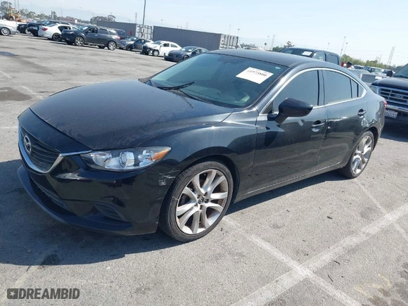 2014 Mazda Mazda6 i Touring with VIN JM1GJ1V69E1155386, listed as a IAAI auction lot 41973800 with 250,808 mi miles. Bid and sale history available at carsss.com. Image 2.