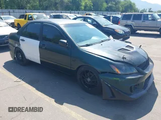 2005 Mitsubishi Lancer ES z VIN JA3AJ26EX5U008122, wystawiony jako IAAI lot #42460392 z przebiegiem Nie podano mil oraz . Historia ofert i sprzedaży dostępna na DreamBid. Obrazek 1.