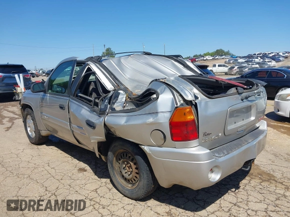 2004 GMC Envoy SLE with VIN 1GKDS13S242420100, listed as a IAAI auction lot 41963800 with 341,395 mi miles and . Bid and sale history available at DreamBid. Image 6.