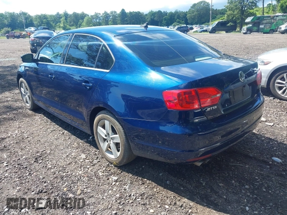 2014 Volkswagen Jetta TDI w/Premium/Nav with VIN 3VWLL7AJ3EM232789, listed as a IAAI auction lot 42737539 with 60,263 mi miles and . Bid and sale history available at DreamBid. Image 3.