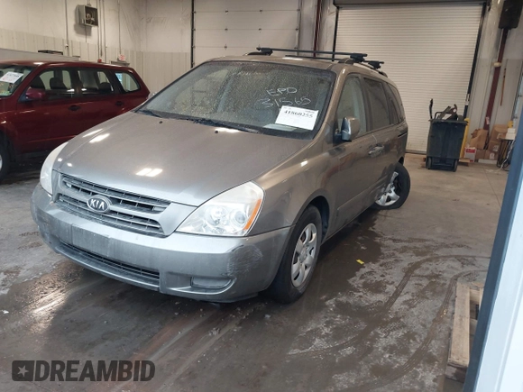 2010 Kia Sedona LX with VIN KNDMG4C31A6331565, listed as a IAAI auction lot 41860255 with 219,233 mi miles. Bid and sale history available at carsss.com. Image 2.