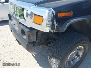 2005 Hummer H2 SUV with VIN 5GRGN23U25H128791, listed as a IAAI auction lot 42115436 with 286,818 mi miles. Bid and sale history available at carsss.com. Image 6.