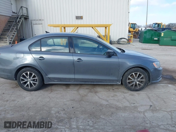 2016 Volkswagen Jetta Sedan 1.4T SE with VIN 3VWD67AJ7GM281671, listed as a IAAI auction lot 41385896 with 153,168 mi miles. Bid and sale history available at carsss.com. Image 13.