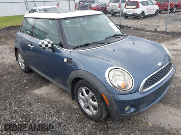 2010 MINI Hardtop with VIN WMWMF3C5XATZ26122, listed as a IAAI auction lot 42377547 with 198,506 mi miles and . Bid and sale history available at DreamBid. Image 1.
