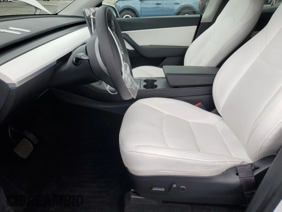 2021 Tesla Model Y Long Range with VIN 5YJYGDEEXMF151686, listed as a Copart auction lot 53903115 with 65,321 mi miles and Salvage Title. Bid and sale history available at DreamBid. Image 7.