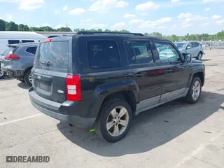 2011 Jeep Patriot Latitude with VIN 1J4NF1GB1BD100499, listed as a IAAI auction lot 42113428 with 195,123 mi miles. Bid and sale history available at carsss.com. Image 4.