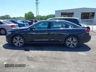 2021 Volkswagen Passat SE z VIN 1VWSA7A30MC003988, wystawiony jako IAAI lot #42238431 z przebiegiem 43 208 mil mil oraz . Historia ofert i sprzedaży dostępna na DreamBid. Obrazek 14.