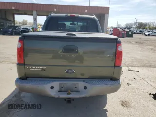 2003 Ford Explorer Sport Trac XLS with VIN 1FMZU77E43UB74698, listed as a Copart auction lot 54210645 with 207,678 mi miles and Salvage title. Bid and sale history available at DreamBid. Image 6.