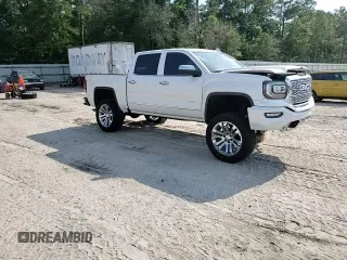 2017 GMC Sierra 1500 Denali z VIN 3GTU2PEJ2HG433669, wystawiony jako Copart lot #57460285 z przebiegiem 131 113 mil mil oraz Szkoda całkowita • Salvage title. Historia ofert i sprzedaży dostępna na DreamBid. Obrazek 14.