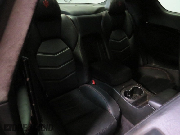 2013 Maserati GranTurismo Sport с VIN ZAM45VLAXD0072023, выставлен на аукционе Copart как лот 78521144 с пробегом 86 008 миль миль и Списание • Salvage title. История ставок и продаж доступна на DreamBid. Изображение 6.