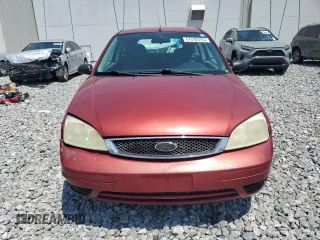 2005 Ford Focus S z VIN 3FAFP31N85R162165, wystawiony jako Copart lot #57292245 z przebiegiem 240 463 mil mil oraz Szkoda całkowita • Salvage title. Historia ofert i sprzedaży dostępna na DreamBid. Obrazek 5.