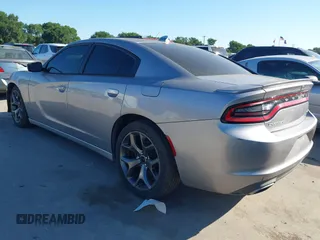 2015 Dodge Charger SXT with VIN 2C3CDXHG8FH884080, listed as a IAAI auction lot 42230385 with 151,948 mi miles and . Bid and sale history available at DreamBid. Image 3.