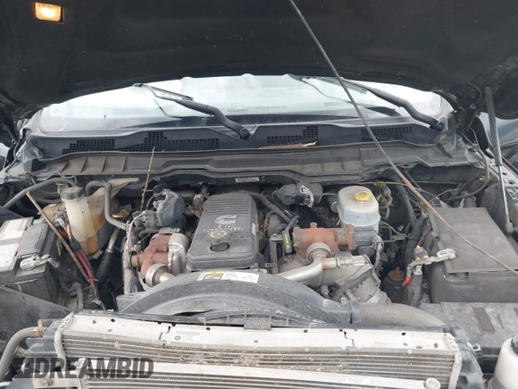 2013 Ram 2500 Laramie z VIN 3C6UR5FL0DG516938, wystawiony jako IAAI lot #39916278 z przebiegiem 198 845 mil mil oraz . Historia ofert i sprzedaży dostępna na DreamBid. Obrazek 10.