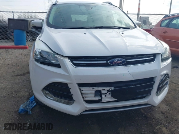 2015 Ford Escape Titanium with VIN 1FMCU9J98FUC76491, listed as a IAAI auction lot 41790638 with 158,196 mi miles and . Bid and sale history available at DreamBid. Image 6.