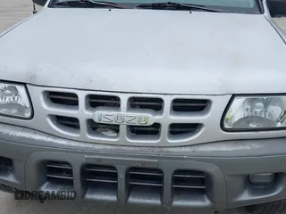 2000 Isuzu Rodeo S with VIN 4S2CK58W3Y4308219, listed as a IAAI auction lot 41939765 with 241,486 mi miles and . Bid and sale history available at DreamBid. Image 6.