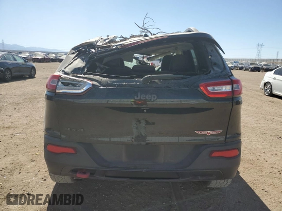 2016 Jeep Cherokee Trailhawk z VIN 1C4PJMBB5GW366190, wystawiony jako Copart lot #67792724 z przebiegiem 103 924 mil mil oraz Szkoda całkowita • Salvage title. Historia ofert i sprzedaży dostępna na DreamBid. Obrazek 6.