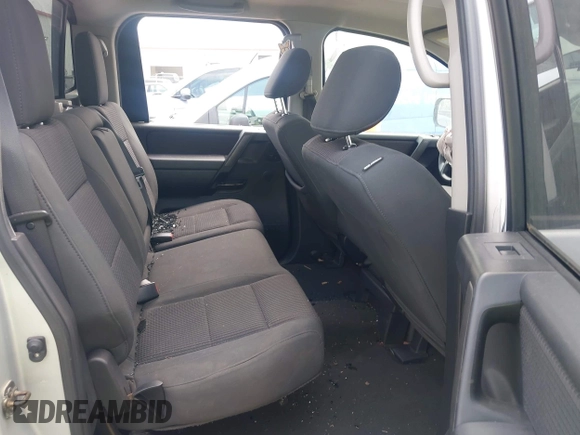 2013 Nissan Titan SV with VIN 1N6AA0EK2DN302357, listed as a IAAI auction lot 42161579 with 199,438 mi miles and . Bid and sale history available at DreamBid. Image 8.