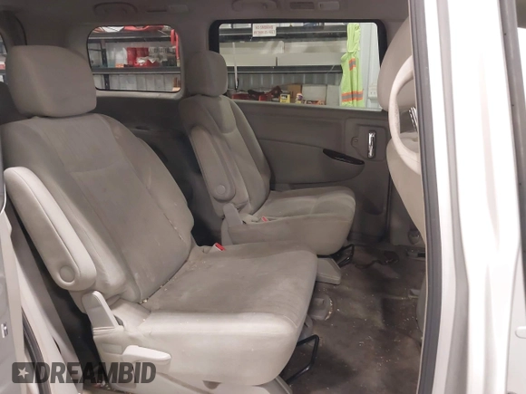 2012 Nissan Quest SL with VIN JN8AE2KP3C9031002, listed as a IAAI auction lot 42000087 with 107,595 mi miles. Bid and sale history available at carsss.com. Image 8.