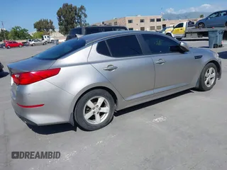 2014 Kia Optima LX with VIN KNAGM4A70E5482966, listed as a IAAI auction lot 42109539 with 194,519 mi miles and . Bid and sale history available at carsss.com. Image 4.