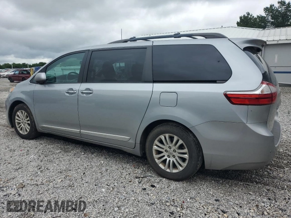 2016 Toyota Sienna XLE with VIN 5TDYK3DC8GS707910, listed as a Copart auction lot 58418535 with 161,527 mi miles and Salvage title. Bid and sale history available at DreamBid. Image 2.
