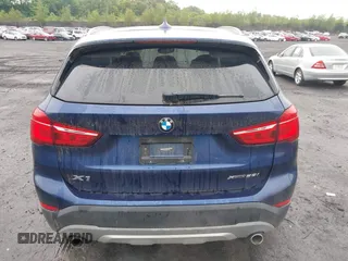 2018 BMW X1 xDrive28i with VIN WBXHT3C32J5L33213, listed as a IAAI auction lot 42513235 with 75,918 mi miles and . Bid and sale history available at DreamBid. Image 16.