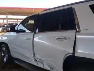 2016 Chevrolet Tahoe LTZ with VIN 1GNSKCKC4GR359442, listed as a IAAI auction lot 41871814 with 158,533 mi miles. Bid and sale history available at carsss.com. Image 13.